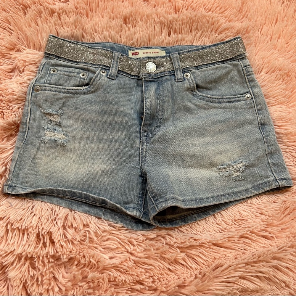 Levi’s girl denim shorty shorts with silver sparkly waist. Size 10